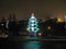 Ukraine, Odessa, Maritime Station, December 28, 2012, Night Scene. Stylized Christmas Tree Shines With Lights On The Entrance Ramp