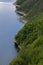 Ukraine. Sammer Karpaty Clouds. Coast, green Zigzag, green trees, blue water