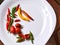 Ukraine Shostka still life vegetables paper tomatoes chilli witÐµ plate