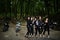 Ukraine, Tarnopol - September 8, 2018: Group of young girls at hen party on choppers and wear black leather dress. Biker Woman on