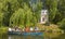 Ukraine - Uman, Sofiyivka Park - June 10, 2017: Tourists float on a boat to enjoy the lively landscapes.