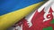 Ukraine and Wales two flags textile cloth, fabric texture