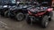 Ukraine, Yaremche - November 20, 2019: Many parked ATVs on a dirt road, close up. four-wheel car, all-terrain vehicle. large