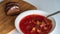 Ukrainian borsch in a plate standing