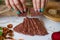 Ukrainian Crispbread  with beetroot and tomato in hands. Healthy diet food. Bread cakes on a white background in the ingredient