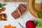 Ukrainian Crispbread  with beetroot and tomato. Healthy diet food. Bread cakes on a white background in the ingredient seasoning