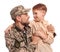 Ukrainian defender in military uniform with his little son on white background