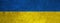 Ukrainian flag background banner panorama - Old rustic damaged concrete stone wall texture background, painted in the colors of