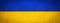 Ukrainian flag background banner panorama - Old rustic damaged concrete stone wall texture background, painted in the colors of