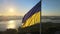 Ukrainian flag in the morning at dawn. Aerial. Kyiv. Ukraine