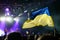 Ukrainian flag supporting a performing ukrainian rock band