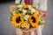 Ukrainian girl with a bouquet of yellow sunflowers