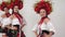 Ukrainian girls show ballet teem dancing in national costumes in studio