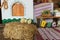 Ukrainian house interior decorated for easter holiday. Little yellow chicks on hay