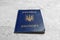 Ukrainian internal passport on grey background