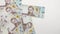 Ukrainian money - Background of thousand banknotes hryvnia lying in a heap