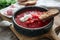 Ukrainian and russian national red soup borsch. Beetroot soup on wooden background