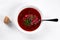 Ukrainian soup borsch on white plate. Borsch with piece of bread.