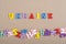 UKRAINIAN word on paper background composed from colorful abc alphabet block wooden letters, copy space for ad text. Learning