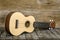 Ukuleles Hawaii guitar on wooden background