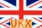 ukx index concept. wooden blocks with ukx lettering on british flag background.