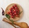 Ull top view of a bunch of cherry tomatoes on a wooden board