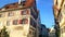 Ulm, Germany. Street flooded with bright sunshine with wooden-clay traditional houses rickety