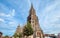 Ulm Minster or Cathedral of Ulm city, Germany. It is medieval tourist attraction of Ulm. View of old Gothic cathedral on blue sky