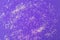 Ultra violet background and sparkles in the shape of stars. Abstraction