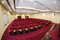 Ultra wide lens Big Hall for business and conference meetings with red seats , stage and big scree