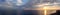 Ultra widescreen panorama of the skyline, sunrise sunset on the black sea