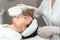 ultraformer lifting. Face Skin Care. Close-up Of Woman Getting Facial Hydro Microdermabrasion Peeling Treatment At