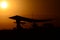 Ultralight airplane at sunset