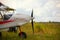 Ultralight weight plane on a grass field