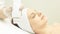 Ultrasonic skin equipment. Woman face cosmetology treatment. Girl clinic facial procedure. Anti acne surgery cleaning