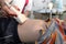 An ultrasound doctor makes an ultrasound of the abdominal cavity of the child. The boy is being examined in the office of the