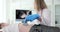 Ultrasound examination of child doctor makes scan of the abdomen of girl in medical clinic.