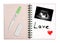 ultrasound film with pregnancy test on recycle notebook