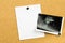 Ultrasound pregnancy photo on cork board. Baby fetus photo as a first pregnancy sticky note