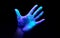 Ultraviolet Light On a Hand Showing Bacteria Growth