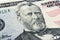 Ulysses S. Grant face on US fifty or 50 dollars bill macro, united states money closeup. Heap of 50 hundred dollar bills on money