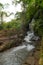 Uma Anyar waterfall, Bali, Indonesia. Jungle, forest, daytime with cloudy sky
