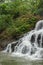 Uma Anyar waterfall, Bali, Indonesia. Jungle, forest, daytime with cloudy sky