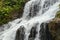 Uma Anyar waterfall, Bali, Indonesia. Jungle, forest, daytime with cloudy sky