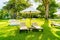 Umbrella and chair in garden for sun bathing