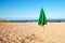 Umbrella On A Deserted Beach