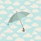 Umbrella over cloudy sky pattern. Autumn, spring background