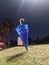 an umbrella stuck in the ground after a heavy rain