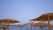 Umbrellas on the Background of the Sea on the Beach in Egypt