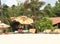 Umbrellas, chairs and a tables on the beach